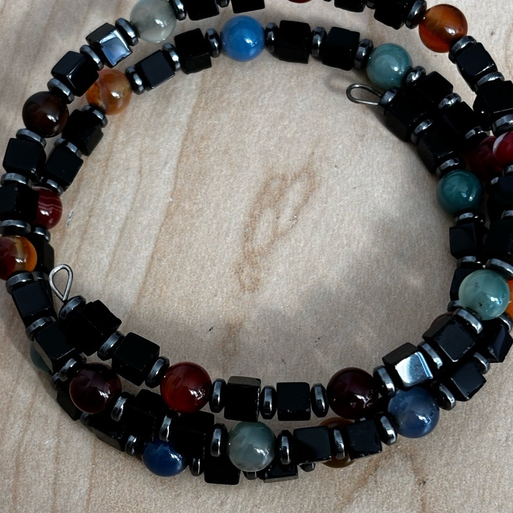 Glass beaded bracelet/ fits size 7 1/4 in wrist/ vibrant colors